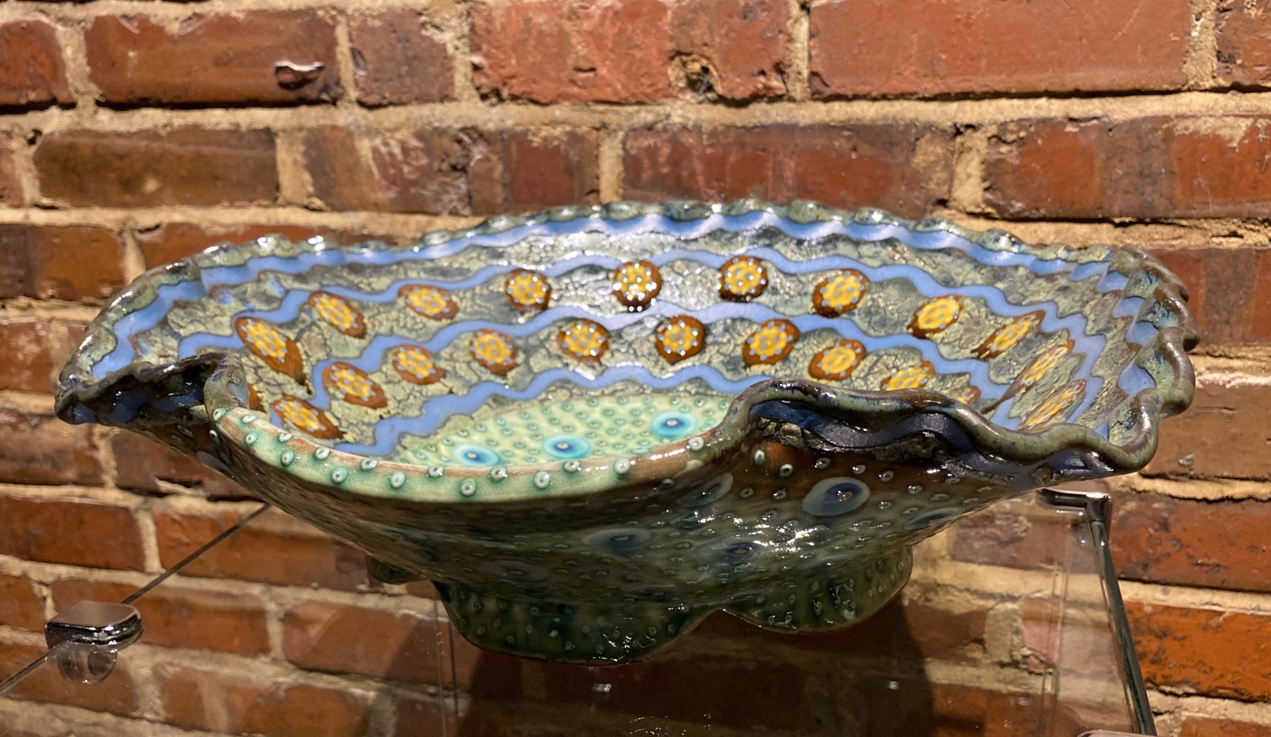 Octopod Bowl by Ronan Peterson, red earthenware and layered slips, 4.5 x 15 x 15 at Craven Allen Gallery  400
